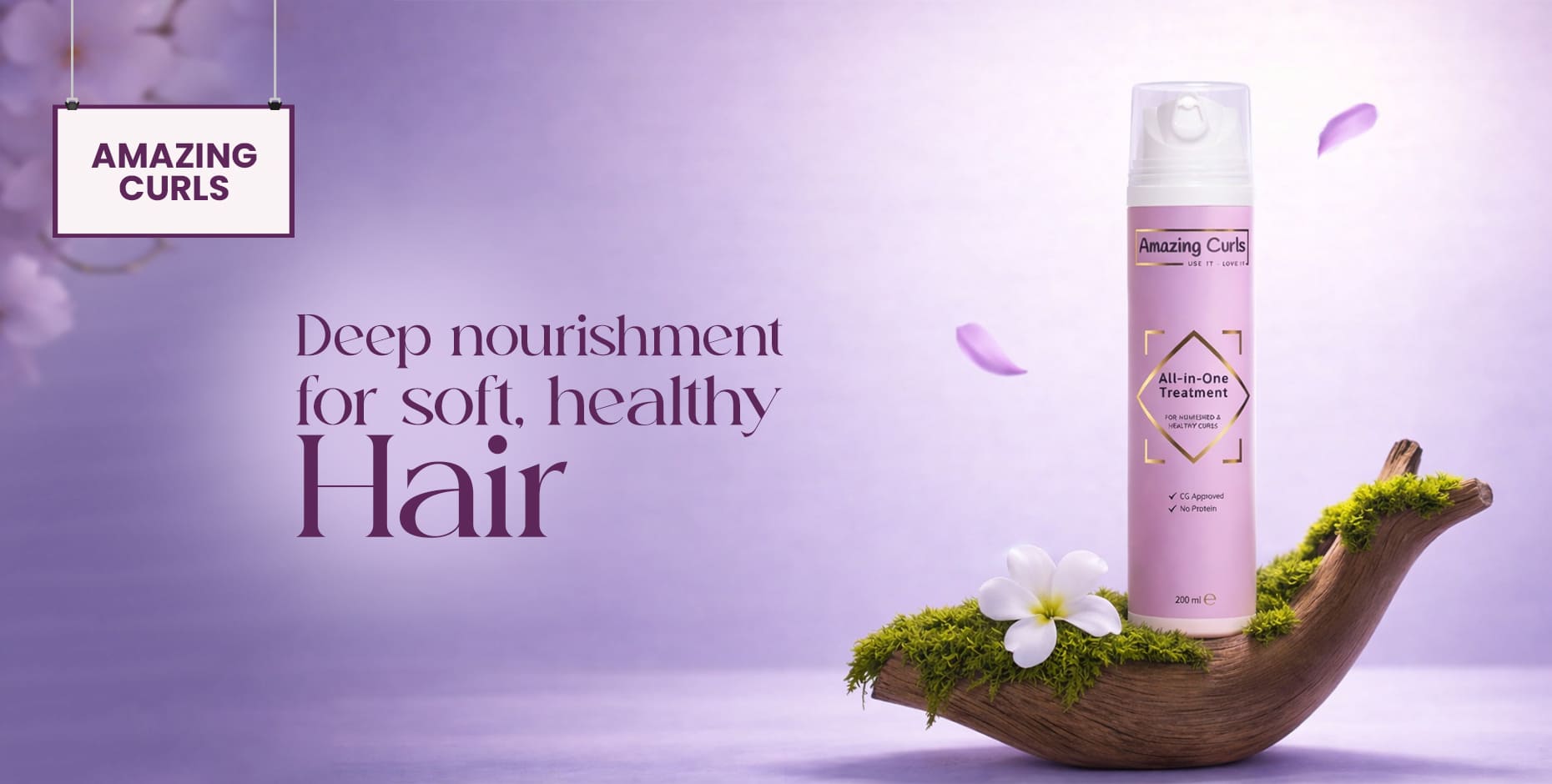 Amazing Curls All-in-One Treatment bottle on mossy wood, with soft purple background and floating petals.