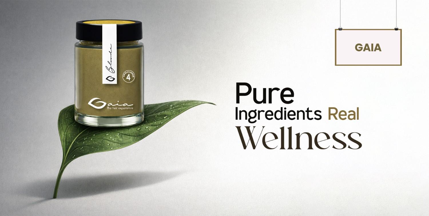 Gaia collection: green powder in a glass jar on a large leaf, promoting natural wellness.