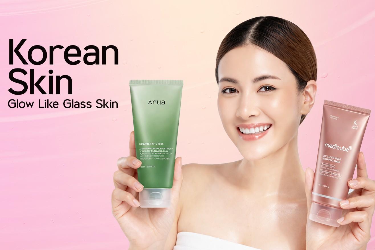 Woman holding skincare products with Korean skin with the slogan "Glow like a glass skin."