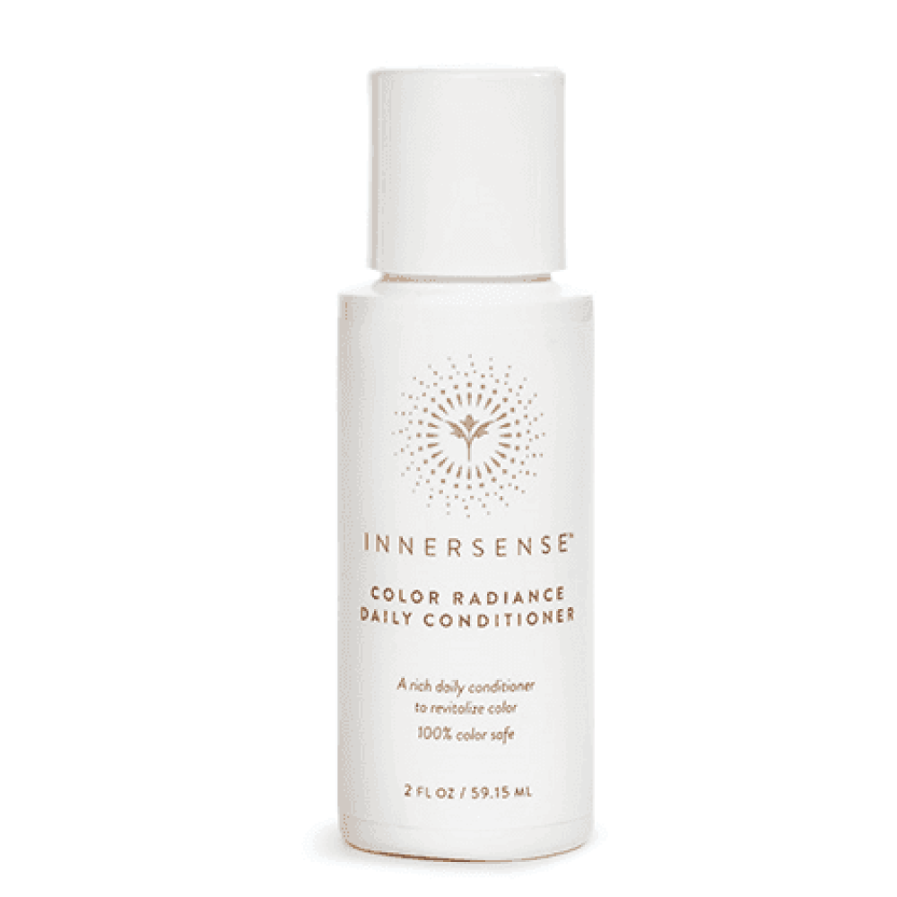 White Innersense Color Radiance Daily Conditioner bottle with a gold logo and text, 2 fl oz size.