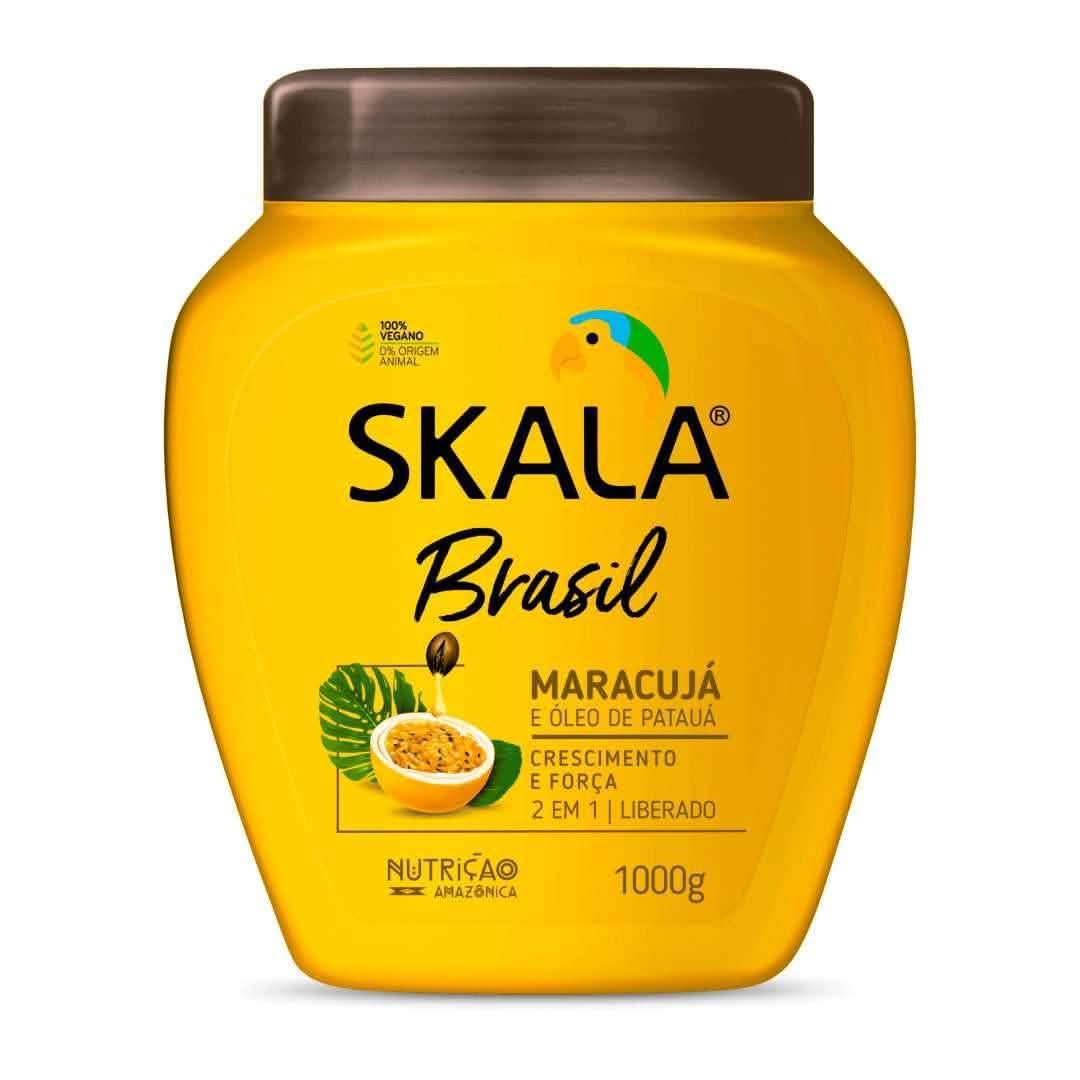 Yellow Skala Brasil Maracujá & Patauá Oil 1000g conditioner with brown lid and passion fruit illustration.