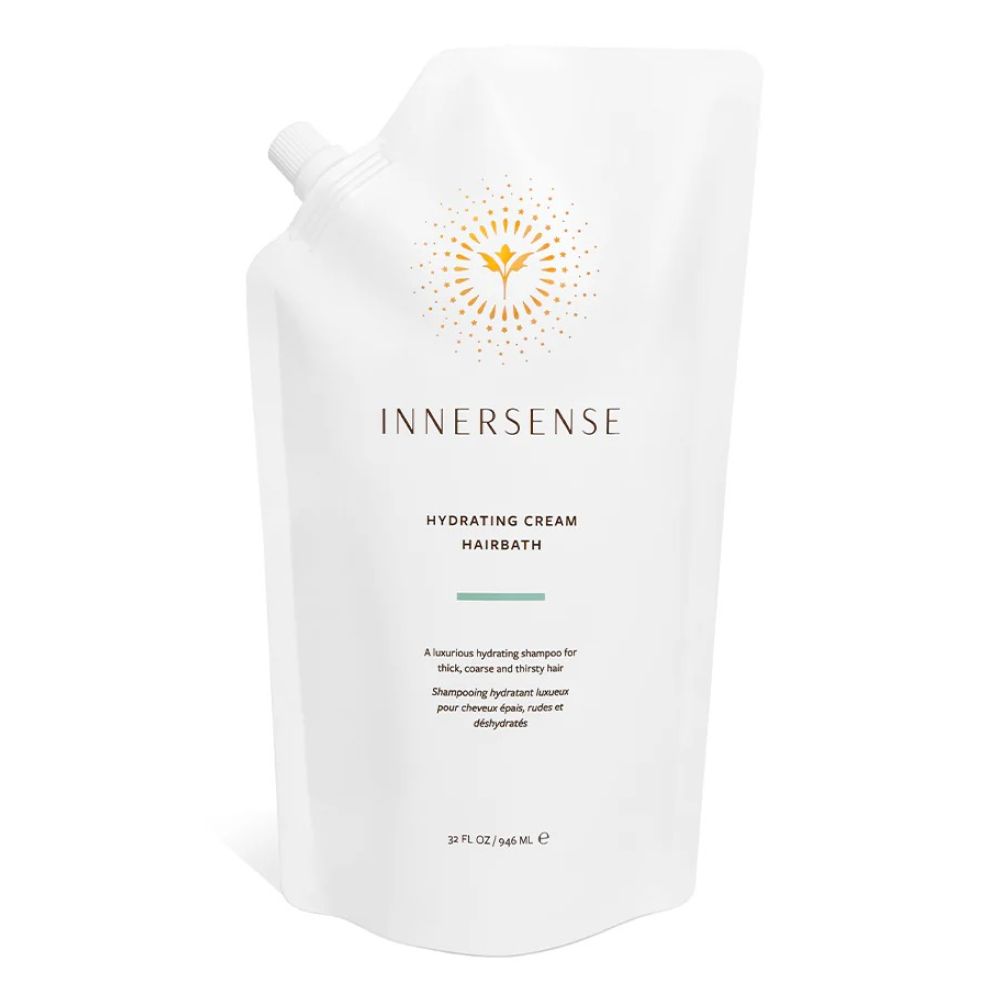 White Innersense Hydrating Cream Hairbath 32 fl oz pouch with an orange sunburst logo.