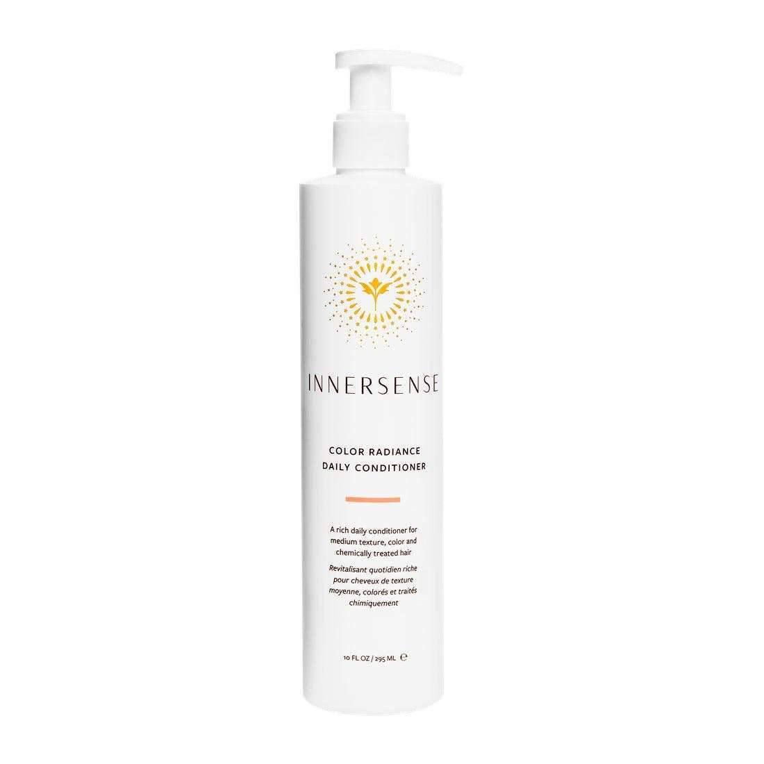 White Innersense Color Radiance Daily Conditioner bottle with a pump, featuring a gold sunburst logo.
