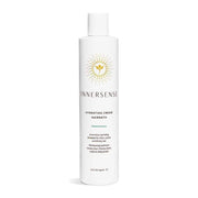 White Innersense Hydrating Cream Hairbath bottle with gold sunburst logo and black text.