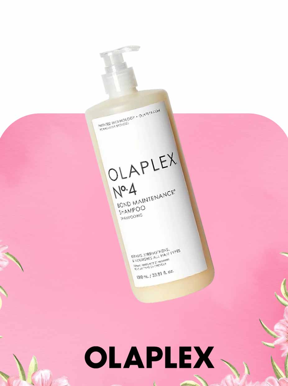 Olaplex shampoo bottle on a pink background 