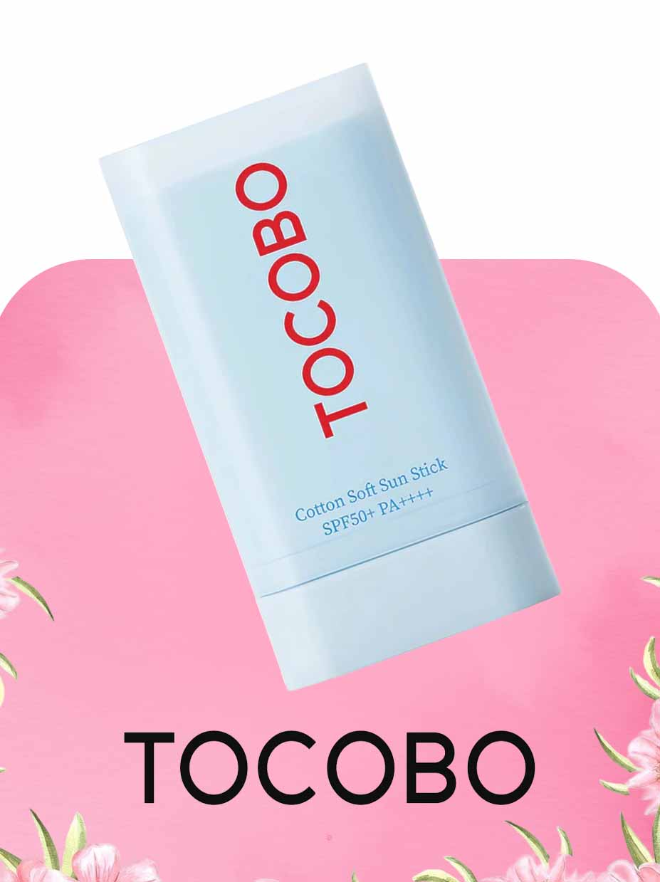Tocobo sunscreen stick on a pink background 